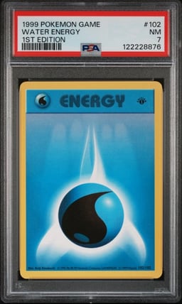 1999 POKEMON GAME 1ST ED #102 WATER ENERGY PSA 7