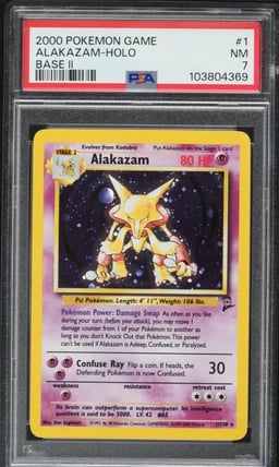 2000 Pokemon Base Set 2 Holo Alakazam #1 PSA 7 NRMT