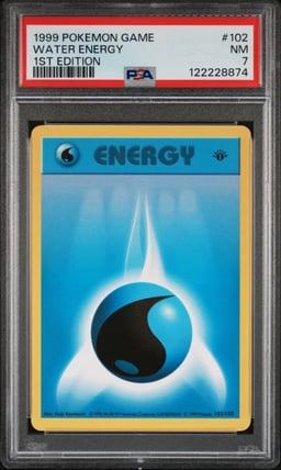 1999 POKEMON GAME 1ST ED #102 WATER ENERGY PSA 7