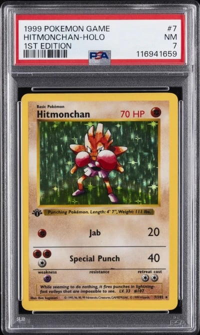 1999 POKEMON BASE SET 1ST EDITION #7 HITMONCHAN-HOLO PSA 7