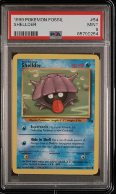 1999 POKEMON FOSSIL #54 SHELLDER
