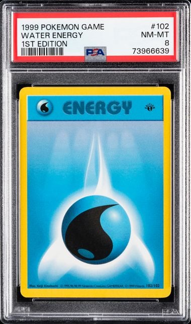 1999 POKEMON GAME #102 WATER ENERGY 1ST EDITION PSA 8